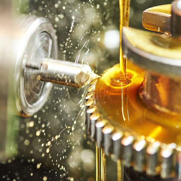 A metalworking fluid is used to maintain a protective film between the die or tool and the metal billet (a length of metal with a round or square cross section, created by continuous casting or extrusion). Such a film acts to reduce the frictional heat generated during the operation. The lubricant is expected to prolong the life of the die or tool, reduce energy requirements, and produce a smooth, stain-free surface of the metal article. In certain nonferrous metalworking applications, KEMAT polybutenes have several advantages over mineral oils when used as a lubricant.